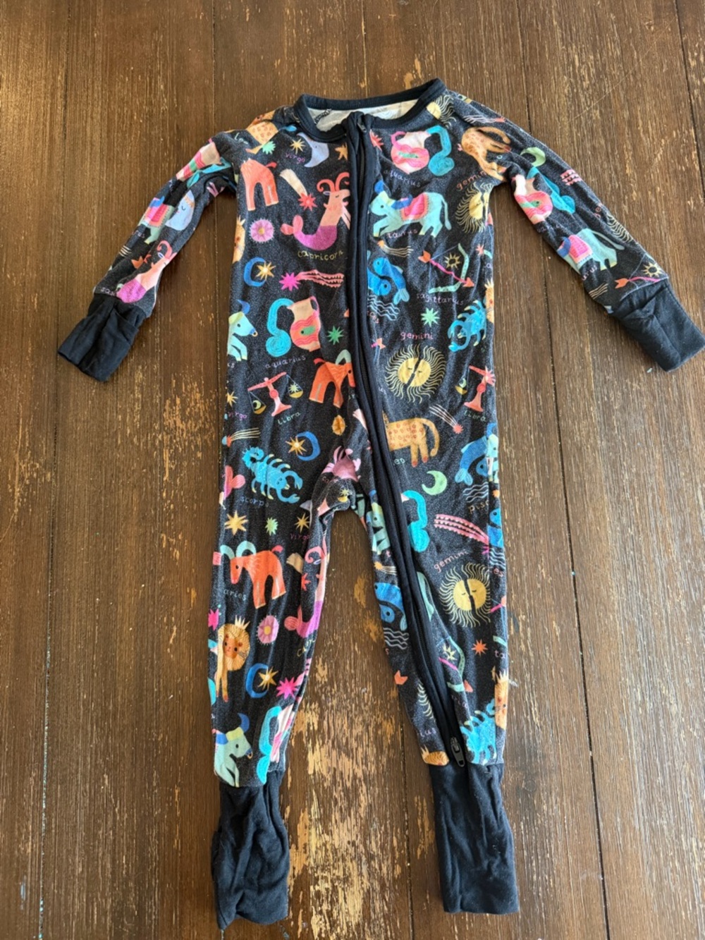 Little Sleepies Black Footed One-Piece Pajamas with Multicolor Animal Print